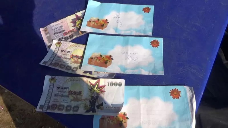 Thailand is currently experiencing a trend of counterfeit currency for 'Game King', be careful when holding it! Because it could be a Muto game appearing above!