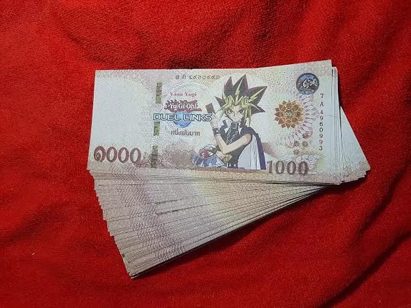 Thailand is currently experiencing a trend of counterfeit currency for 'Game King', be careful when holding it! Because it could be a Muto game appearing above!