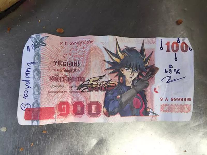 Thailand is currently experiencing a trend of counterfeit currency for 'Game King', be careful when holding it! Because it could be a Muto game appearing above!